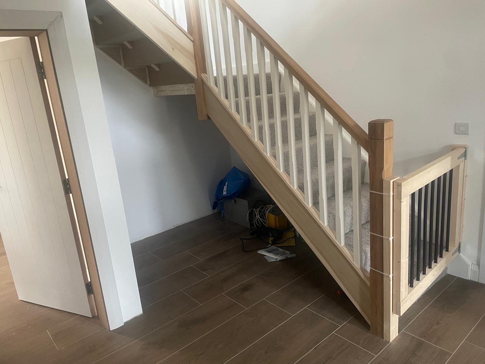 Before: Shallow understairs, drawer storage with door access