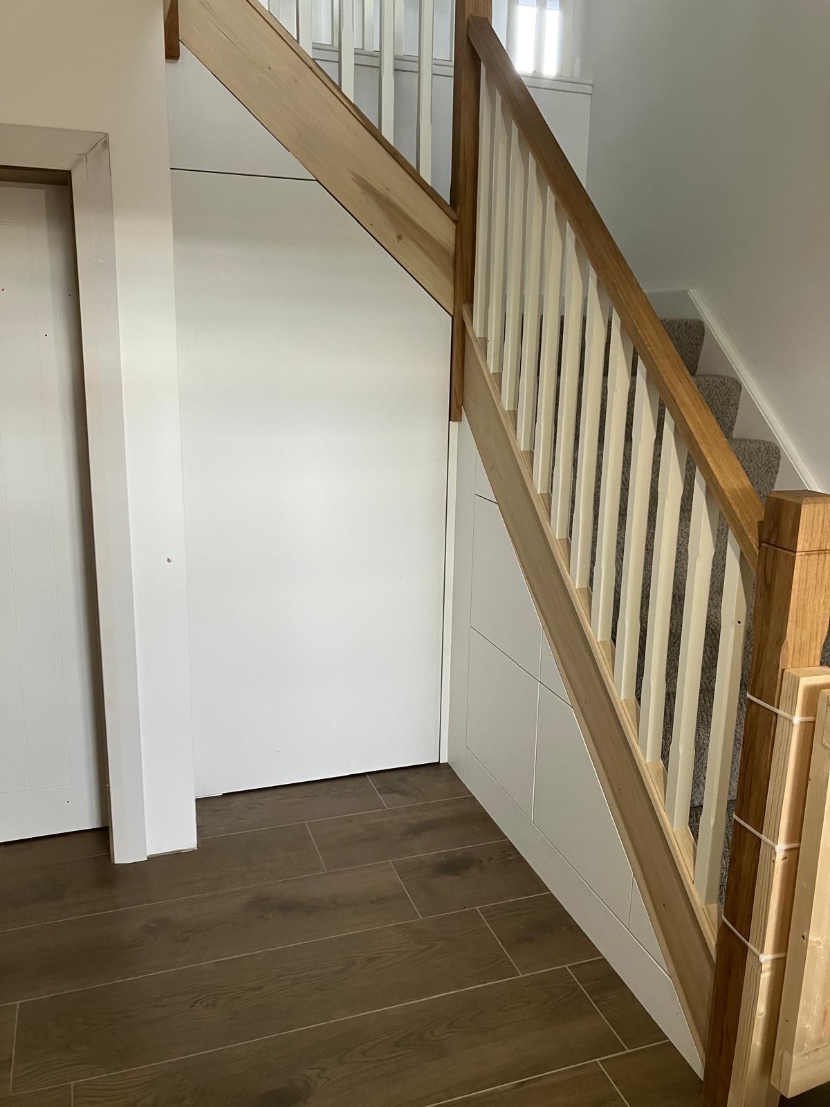 After: Shallow understairs, drawer storage with door access