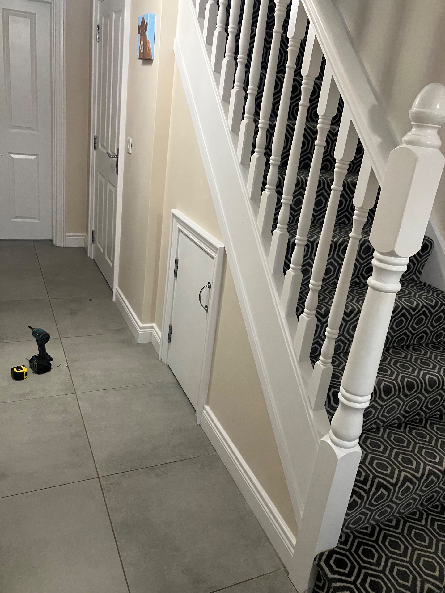 Before: This push to open 3 drawer unit was fitted in Antrim town turning an inadequate storage space into stylish practical drawers and door for taller items