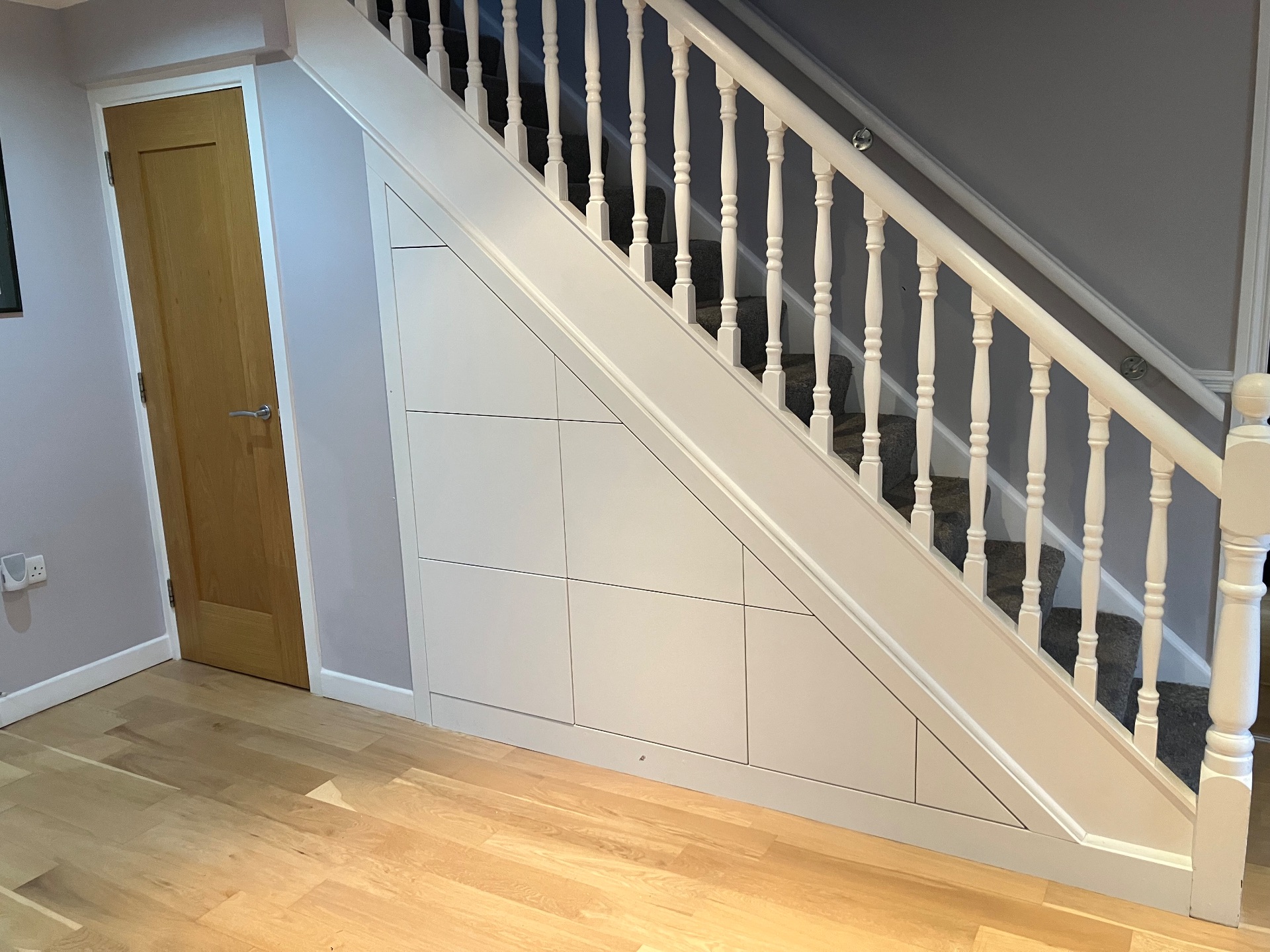 After: I made this under used space into a fully functioning set of accessible drawers with tall storage space available to the left. 